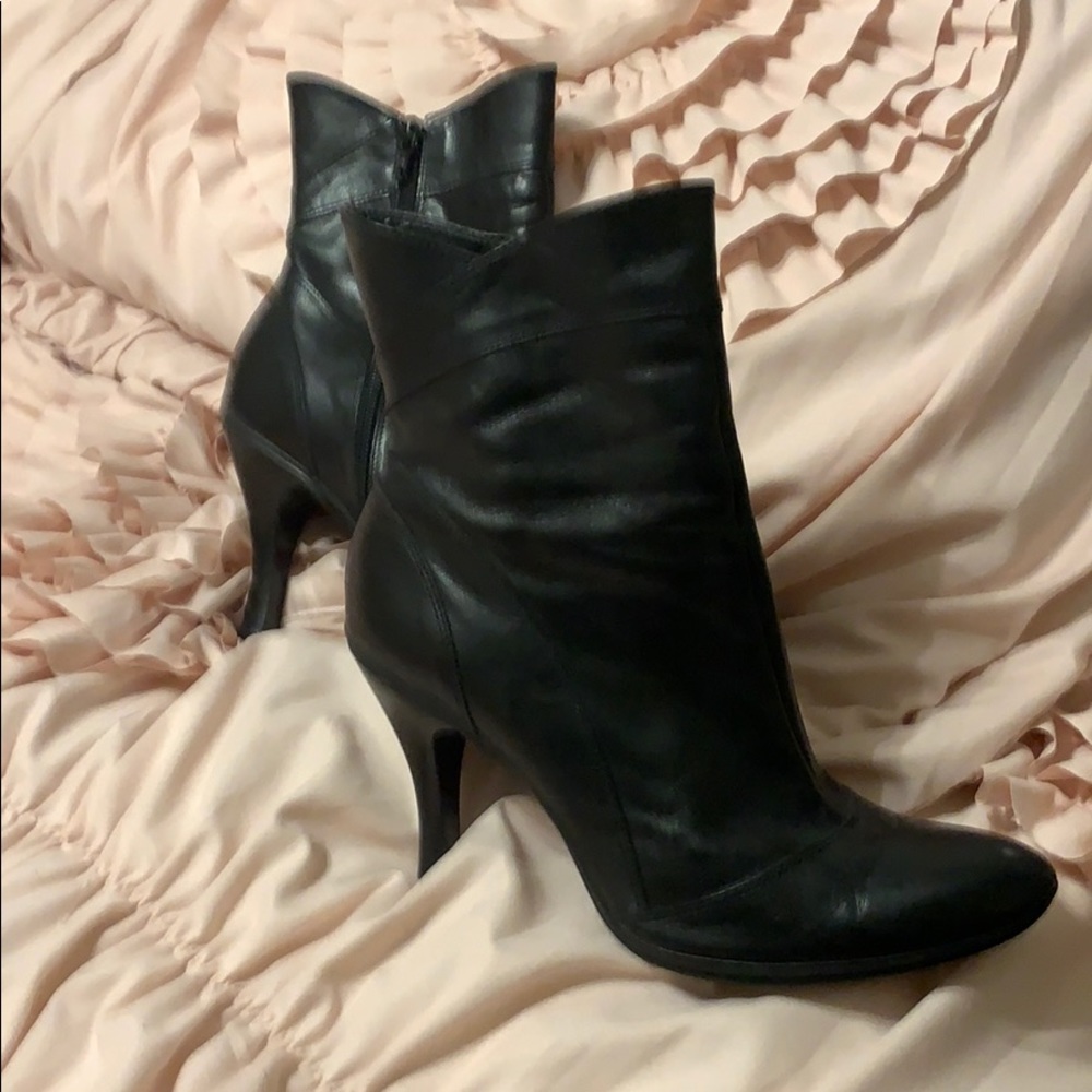 Black leather booties with 3.5 inch heel.